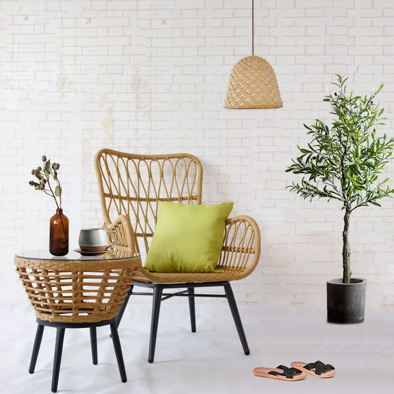 Outdoor balcony table and chair three piece set combination courtyard leisure lazy small backrest chair lounge chair Nordic style handmade rattan chair